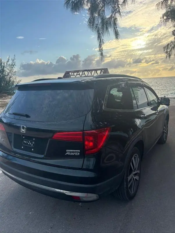 Rear view of a Honda Pilot AWD in Eleuthera